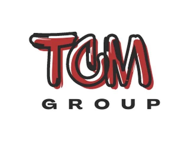 The TCM Group logo: TCM in red graffiti letters over the word GROUP